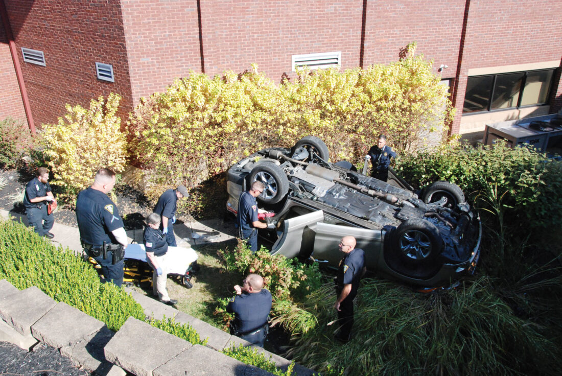 Picture This: Car flips in Parkersburg auto accident - News and Sentinel